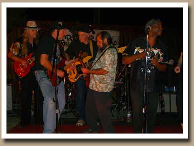 Obie Dee, T-Bone Bagget and Stan Alves on guitar with Franco "Kid Calico" Giovanonni on bass guitar and Donnie "The Velvet Dinosaur" Baker singing vocals